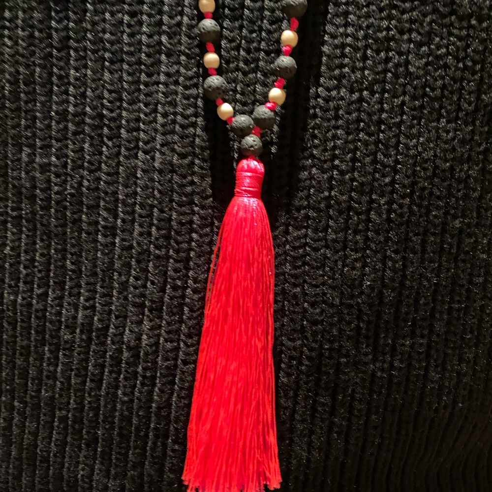 Beaded necklace with tassle